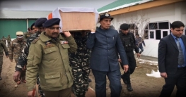 সেনার কফিন নিজ কাঁধেই বইলেন ভারতীয় স্বরাষ্ট্রমন্ত্রী